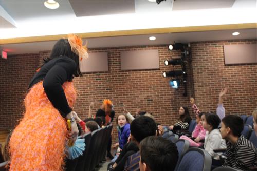 Woman talks to students in the audience